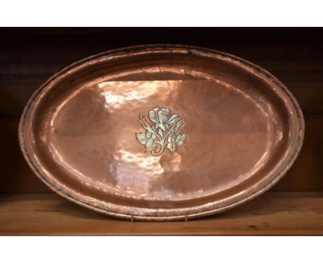 An Art and Crafts planished oval tray, stamped HW, Hugh Wallace, 43.5cm wide