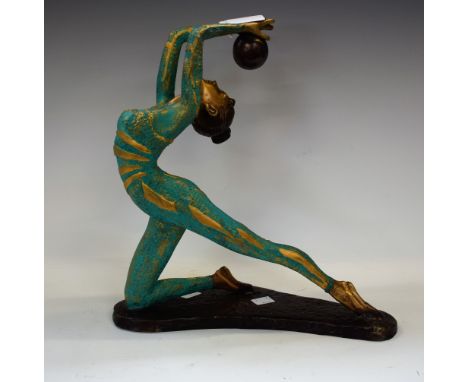 An Art Deco style bronze figure, as a ballet dancing girl with ball, green and gilt painted costume, shaped base, 32.5cm high
