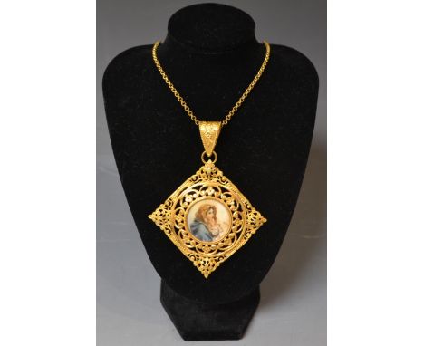 A 19th century style portrait miniature pendant necklace, circular central panel of a young girl with floral head scarf and b