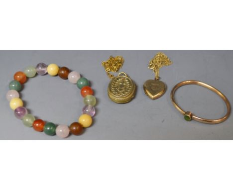 A Victorian anchor and heart locket; an agate bracelet; a bangle and a rolled gold heart locket 