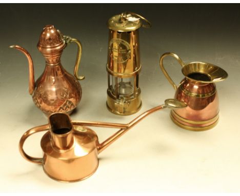 Metalware - an Eccles Type 6 colliery miners lamp; copper and brass jug; another; a similar watering can (4)