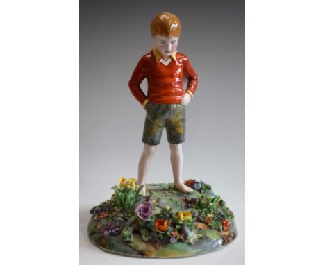 A Crown Staffordshire ceramic figure, Boy in Flower Meadow, modelled by T. Bayley, 25cm high