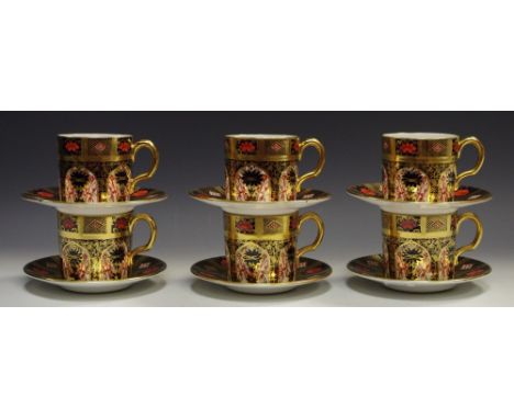 Six Royal Crown Derby coffee cups and saucers