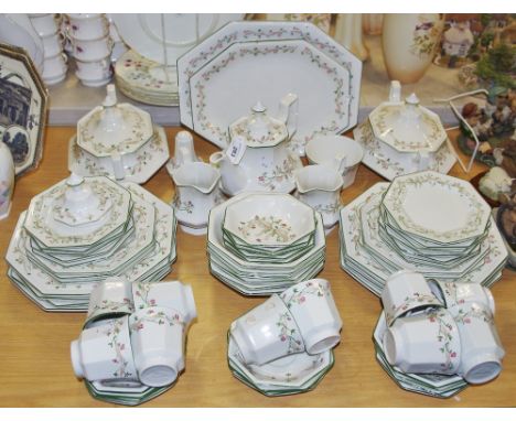 A Johnson Brothers Eternal Beau pattern part dinner and tea service, including teapot, cups, saucers, side plates, milk jugs,