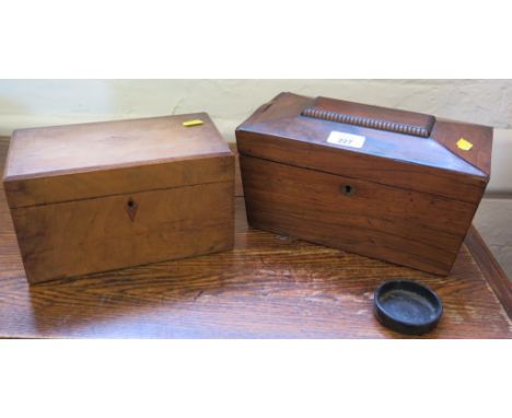 An early 19th century rosewood box of sarcophagus form, formerly a tea caddy, 27cm wide, and another walnut tea caddy of rect