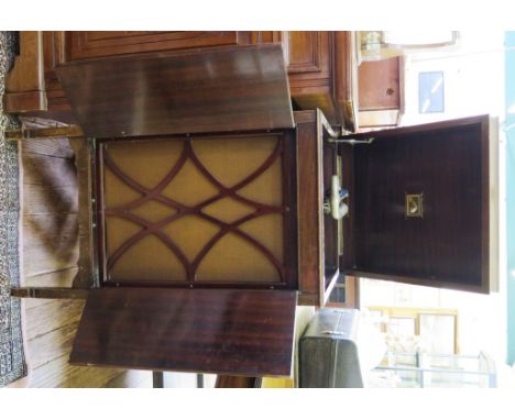 A crossbanded mahogany cased gramophone by His Master's Voice, with diamond shape fretwork speaker frame, 46cm x 93cm