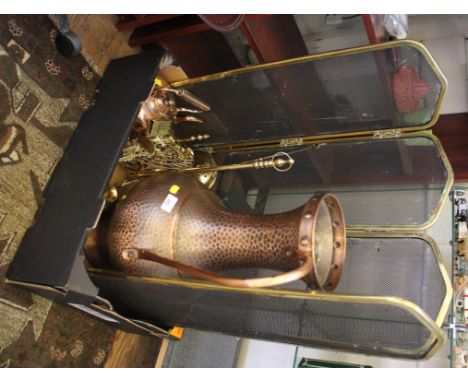 A large hammered copper ewer 59cm high, a brass firescreen and various other brass and copperwares