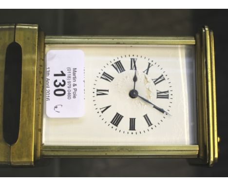A brass carriage timepiece, with white dial, 14cm high, and a modern French style mantel clock (2)