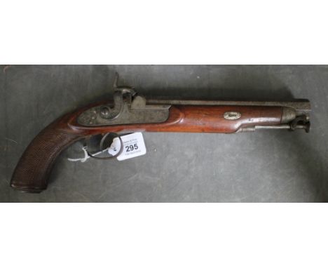 An 18th century percussion cap pistol, with scroll engraved lock, octagonal barrel, engine turned handle, hinged rod, and com