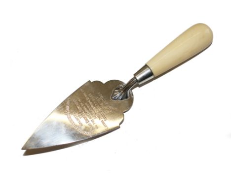 A silver trowel, with ivory handle, inscribed 'presented by Fredrick G. Sainsbury architect to Lady Edward Somerset' for the 