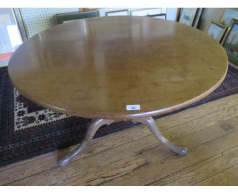 A George III mahogany snaptop tripod table, reduced in height, the circular top on a turned stem and cabriole legs, 90cm diam