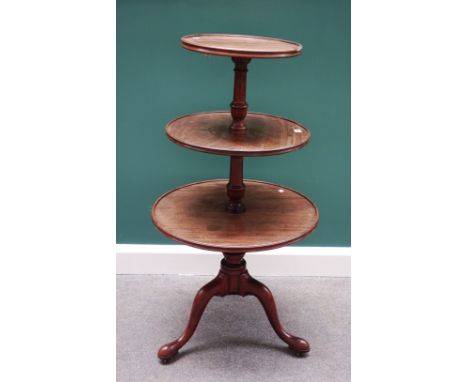 A George III mahogany graduated three tier dumb waiter, on tripod base, 61cm wide.
