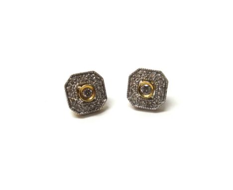 A pair of 9ct gold and diamond set cut cornered square cluster earstuds, each mounted with the principal circular cut diamond