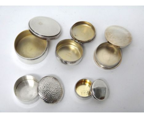 A silver circular box, the lid with engine turned decoration, Birmingham 1934, a silver circular box, the lid with Martele de