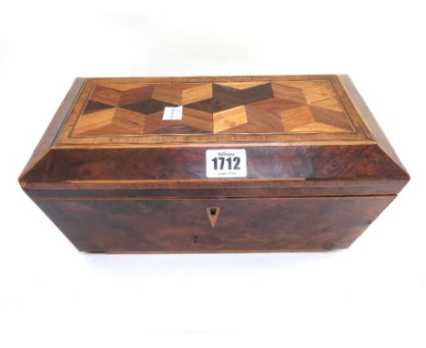 An early 19th century yew wood specimen deceptive cube parquetry inlaid tea caddy of sarcophagus form, 31cm wide, together wi