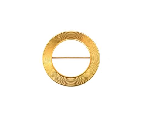A Cartier gold brooch, of circular form, with concentric decoration, detailed Cartier 14 K 21331, diameter 3.7cm, weight 8 gm