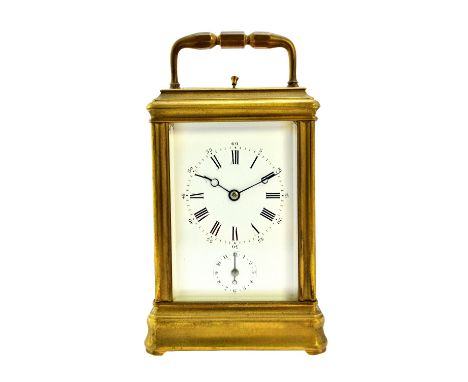 A brass cased carriage clock, late 19th/early 20th century, hour push repeat, with subsidiary alarm dial and two train moveme