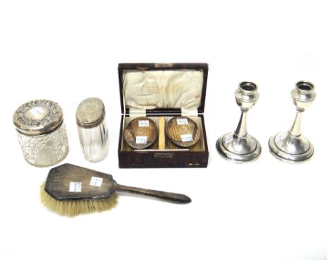 A pair of silver mounted oval hairbrushes and a matching comb, Birmingham 1926, with a case and further silver mounted wares,