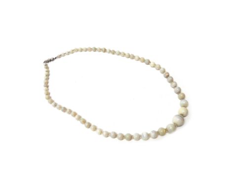 A single row necklace of graduated opal beads, with faceted crystal divisions at intervals and on a 9ct white gold and rose d