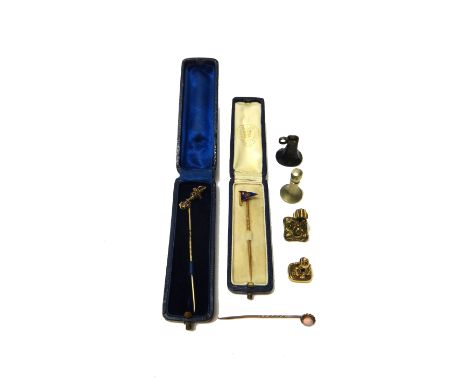 A gold and blue enamelled stick pin, designed as a yachting pennant, detailed 18 CT Benzie, Cowes, cased, a Victorian stick p