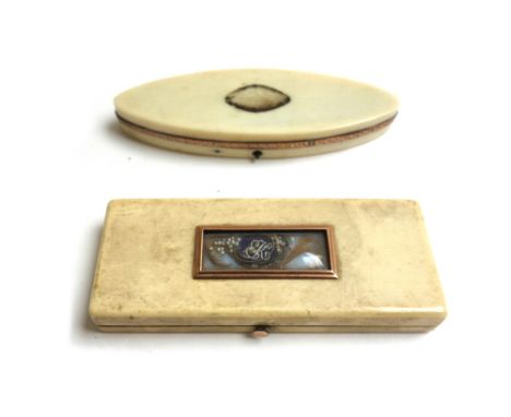 A George III ivory rectangular patch box, with window inclusion to the lid containing an oval monogram and a lock of hair, 9c
