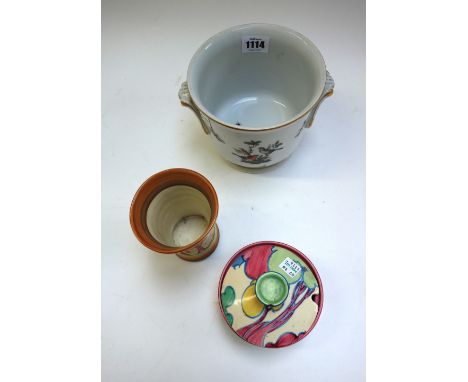 A Clarice Cliff circular pot and cover decorated in the `Pastel Autumn' pattern, 10cm diameter, together with a Clarice Cliff