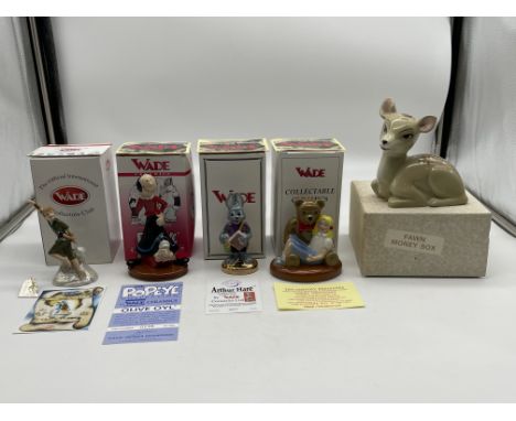 Four Boxed Wade Figurines along with Boxed Wade Money Box. 
Good condition, no damage. 