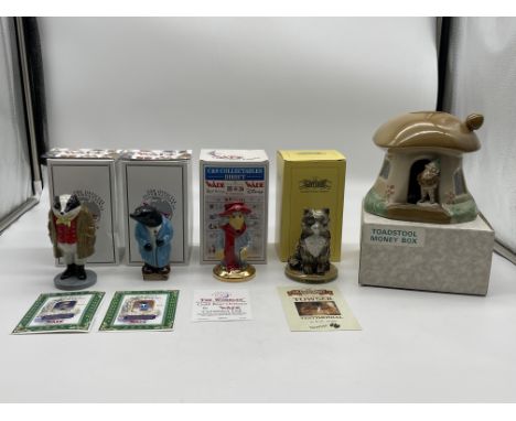 Four Boxed Wade Figurines along with Boxed Wade Money Box. 
Good condition, no damage. 