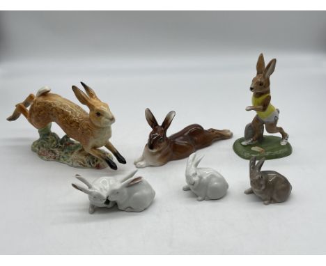 Collection of Hare and Rabbit Figurines to include Beswick England, Royal Doulton, Acorn, and Royal Copenhagen. 
Good conditi