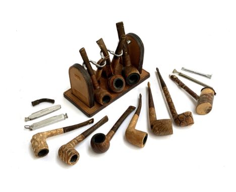 A leather pipe stand, and a quantity of gentleman's pipes (12), to include several Dunhill Root briar, Dunhill Bruyere, Plumb