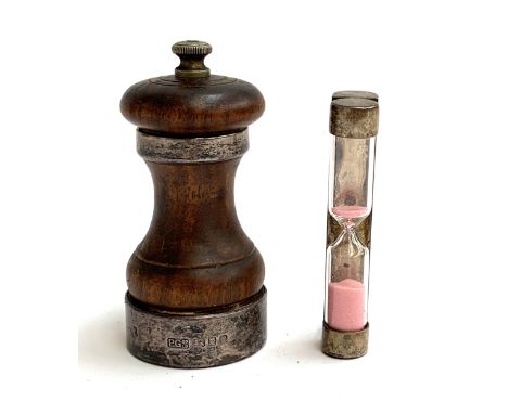 A Garrard &amp; Co silver mounted egg timer, London, 1993, together with a silver mounted Peter Piper pepper mill 