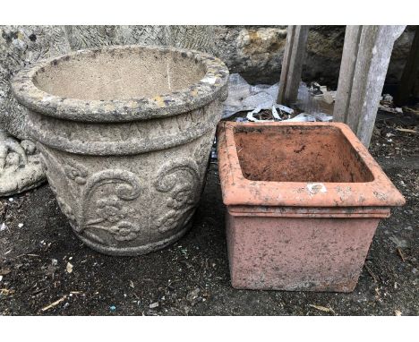 A composite stone planter, 30cmH, together with a terracotta square planter 
