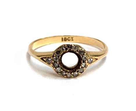 A small 18ct gold ring set with diamond chips, missing central stone, size J, approx. 1.9g 