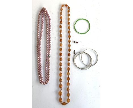 An agate bead necklace with rock crystal spacers, 40cmL, together with a 925 silver shell charm, faux pearl necklace, glass b