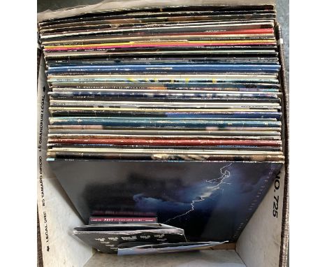 A mixed box of vinyl LPs to include Dire Straits, Bob Dylan, Eagles, Earth, Wind &amp; Fire, ELO, Genesis, Michael Jackson, T