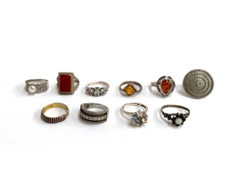 A lot of ten silver rings, mainly 925 silver, one fully hallmarked English silver set with an opal and garnets (one garnet mi