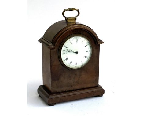 A mahogany cased mantel clock with key, domed top with white enamel dial with Roman numeral and Arabic seconds, 21cmH 