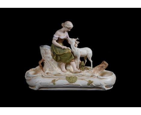 A Royal Dux porcelain flower-trough, c.1930, modelled as a a rustic maiden with a prickett Pink raised triangle mark, 33x25cm