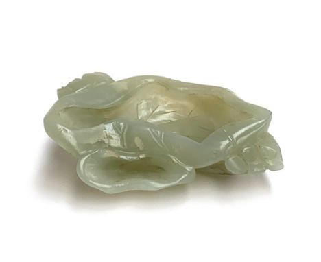 A Chinese celadon jade brush washer in lotus leaf and flower form, 7cmW 