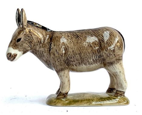 A ceramic figure of a donkey, 10cmH 