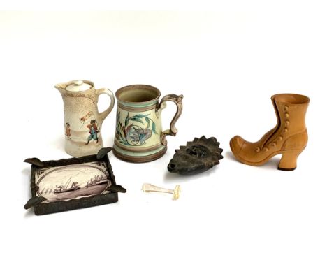 A studio pottery tankard, A Royal Doulton nursery rhymes lidded jug, Roman style oil lamp, Delft tile ashtray and a 1950s Bar