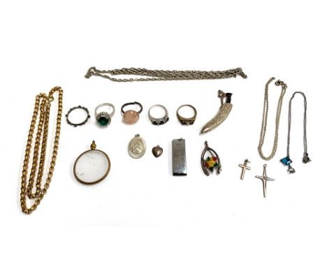 A quantity of jewellery to include silver pendants and chains; white metal chain; gilt metal belcher chain; steel ingot; phot