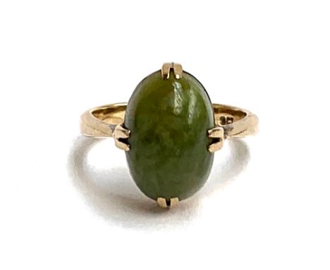 A 9ct gold ring set with a Connemara marble cabochon, 3.7g, size K 