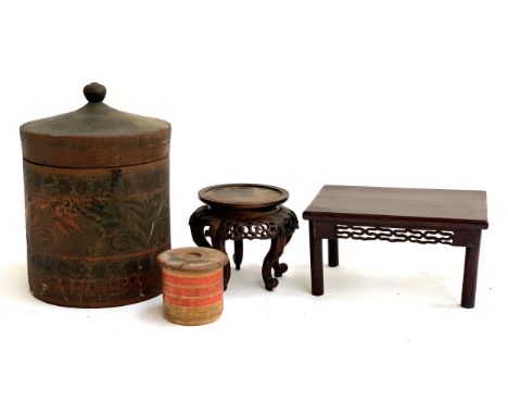 A Chinese miniature hardwood table, 10.5cmH, a carved hardwood bowl stand, Japanese treen game, rice box 