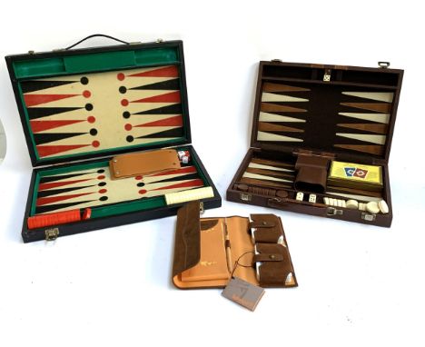 Two backgammon boards, together with a cased set of timberland playing cards 