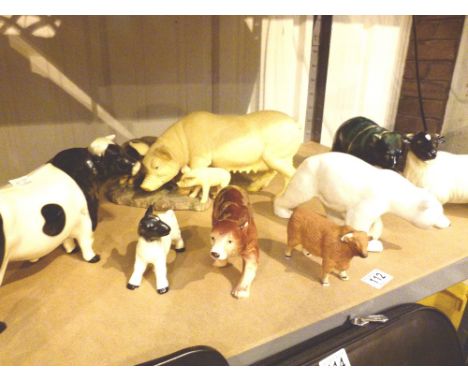 Shelf of resin and ceramic animals