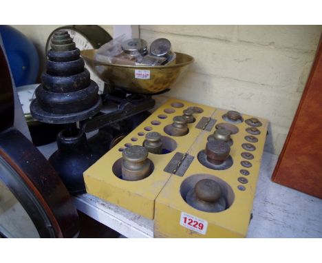 A set of cast metal kitchen scales; together with a cased part set of weights. 