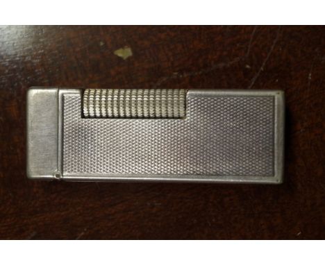 A Dunhill electroplated 'Rollagas' lighter. 
