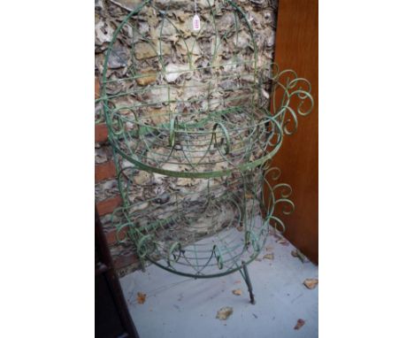 A green painted wirework semi circular two tier planter,&nbsp;109cm high x 75cm wide.&nbsp; 