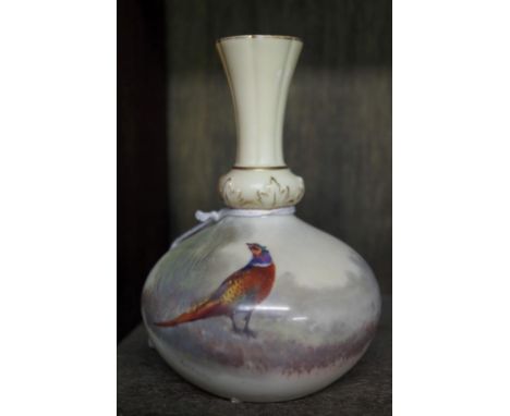 A Royal Worcester blush ivory vase, circa 1905, painted with a pheasant by James Stinton, signed, 12cm high, (restored). 